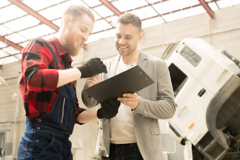 happy-men-in-auto-repair-service-768x512